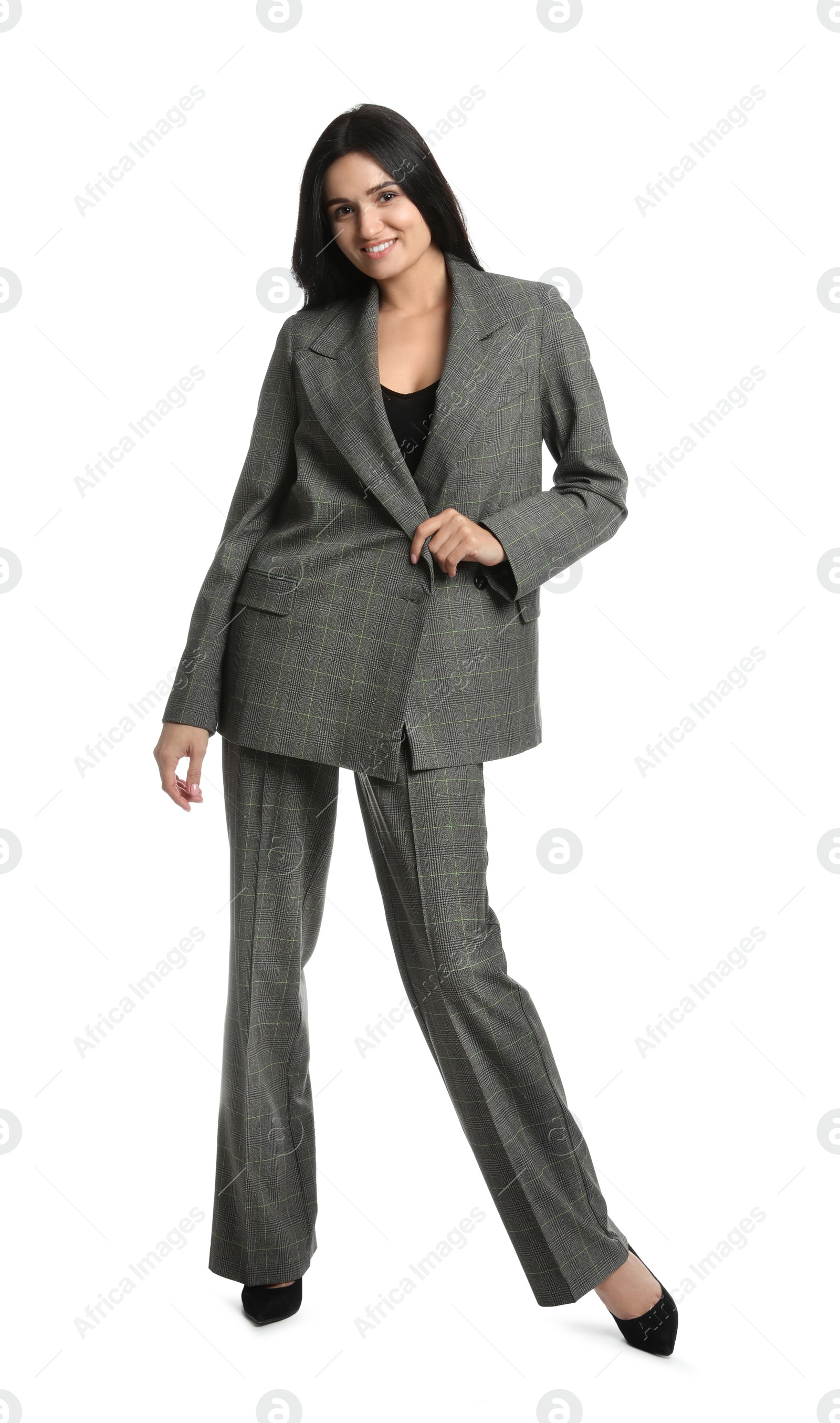 Photo of Full length portrait of beautiful woman in formal suit on white background. Business attire