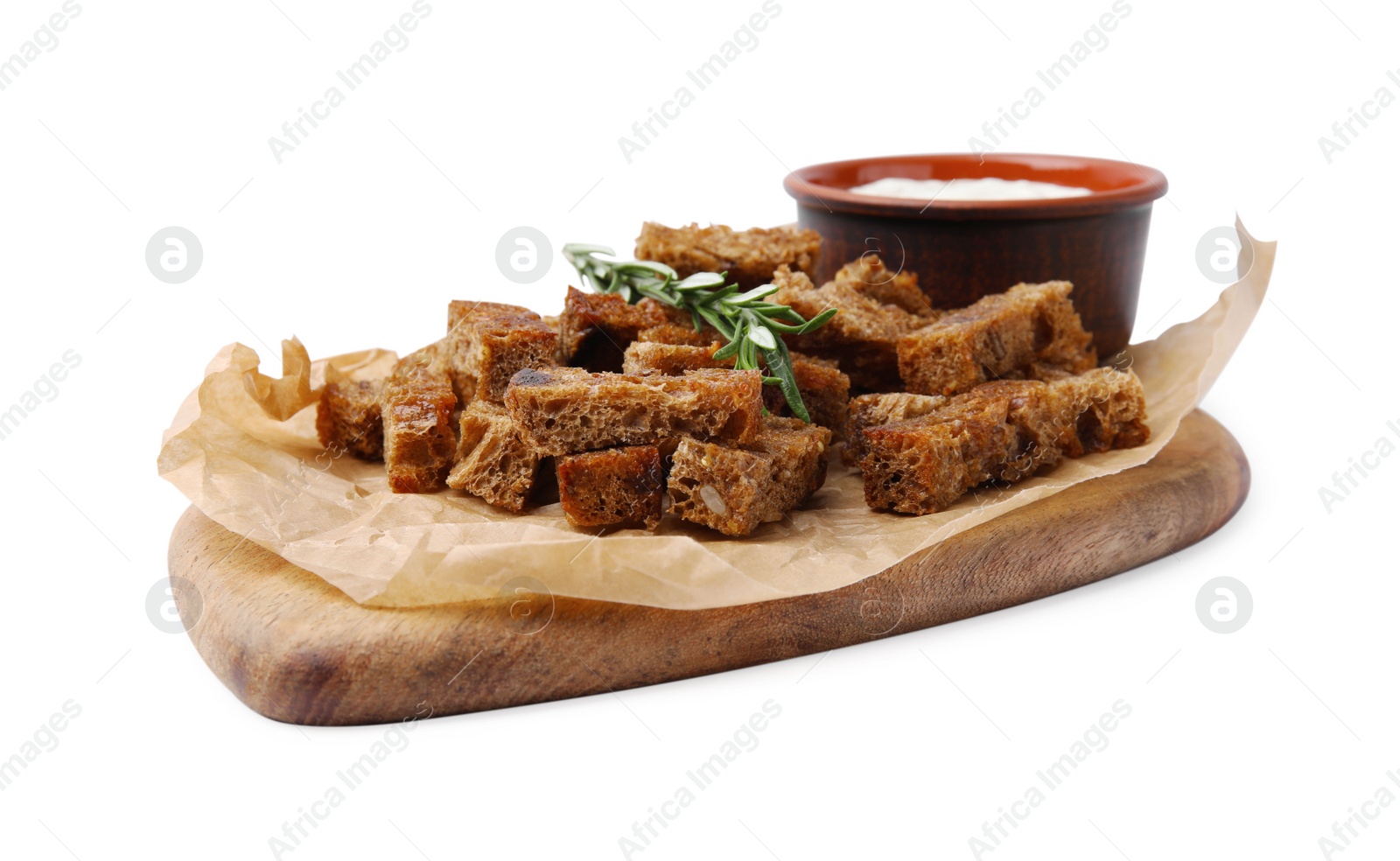 Photo of Crispy rusks with rosemary and sauce isolated on white