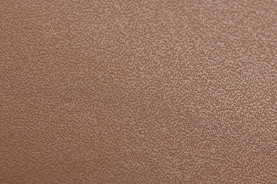 Photo of Brown natural leather as background, top view