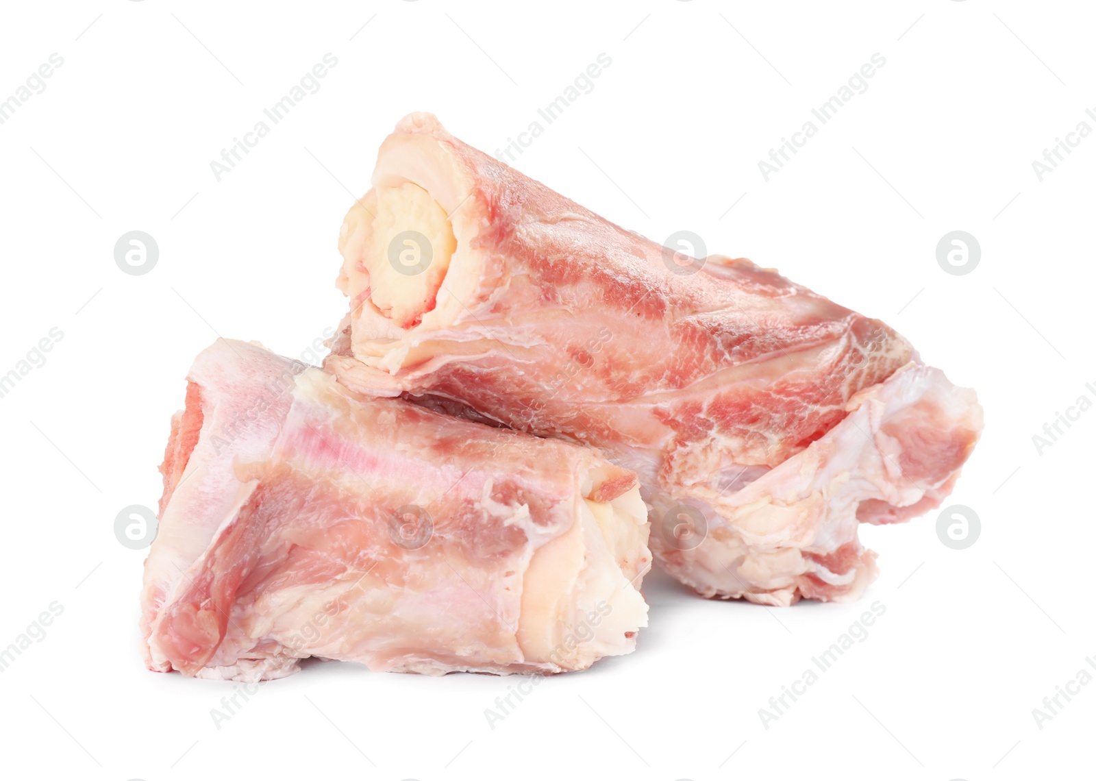 Photo of Raw chopped meaty bones on white background