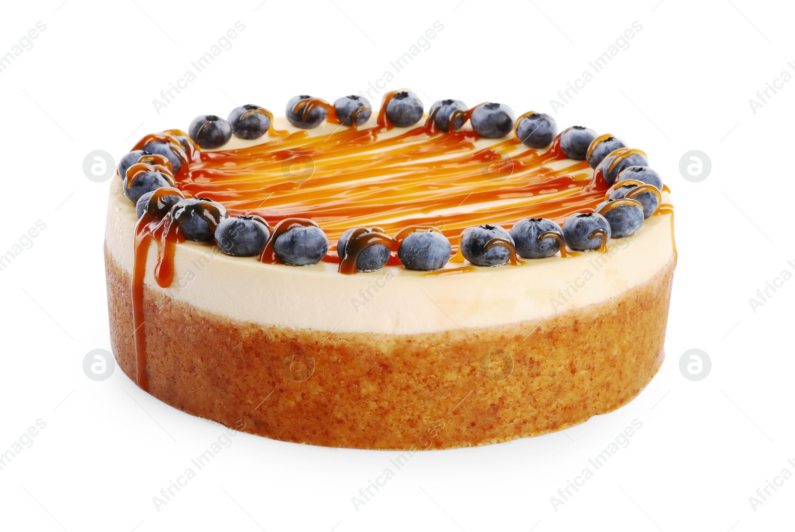 Photo of Delicious cheesecake with caramel and blueberries isolated on white