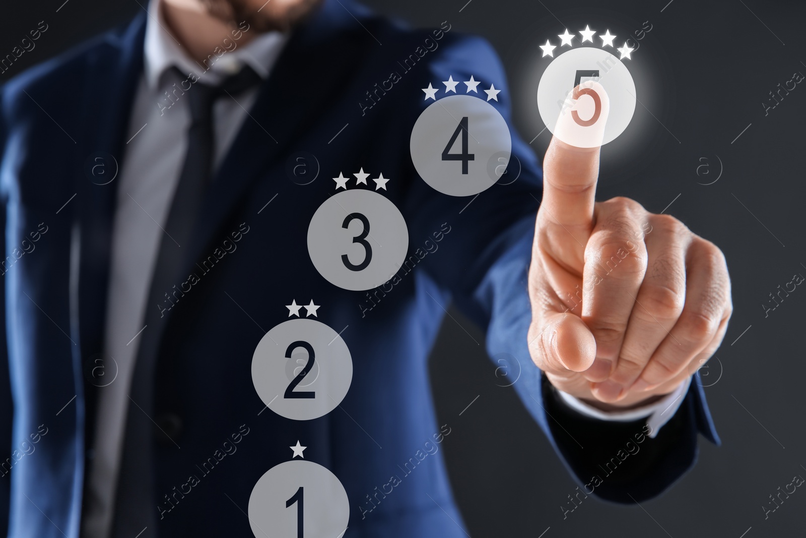 Image of Man choosing five stars on virtual screen against grey background, closeup. Customer satisfaction score