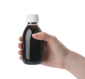 Photo of Woman holding bottle of syrup isolated on white, closeup. Cough and cold medicine