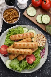 Delicious grilled vegan sausages with fresh herbs and vegetables on grey table, flat lay