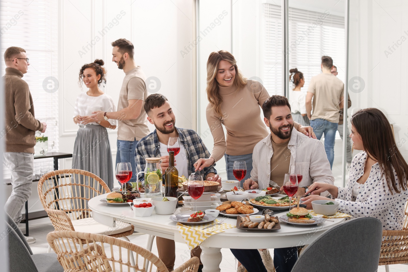 Photo of Group of people having brunch together indoors