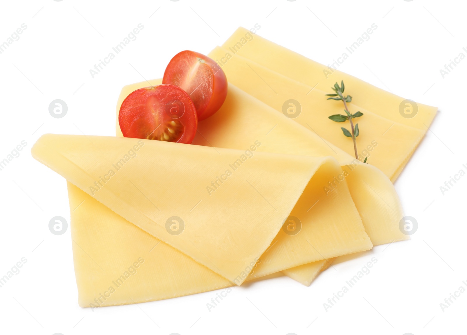 Photo of Slices of tasty fresh cheese, thyme and tomatoes isolated on white, above view