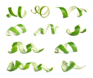 Image of Set of lime peels on white background