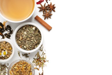 Composition with fresh brewed tea and dry leaves on white background, top view