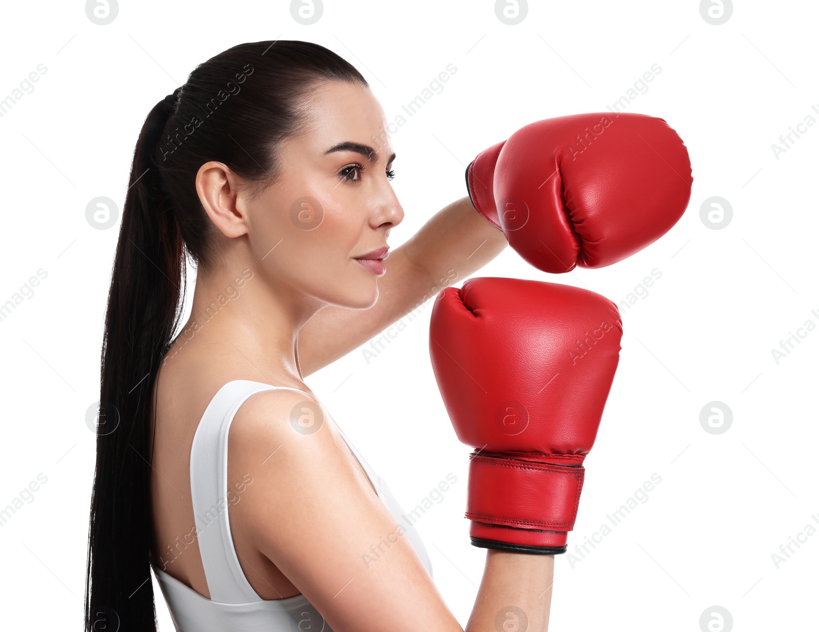 Photo of Beautiful woman in boxing gloves on white background