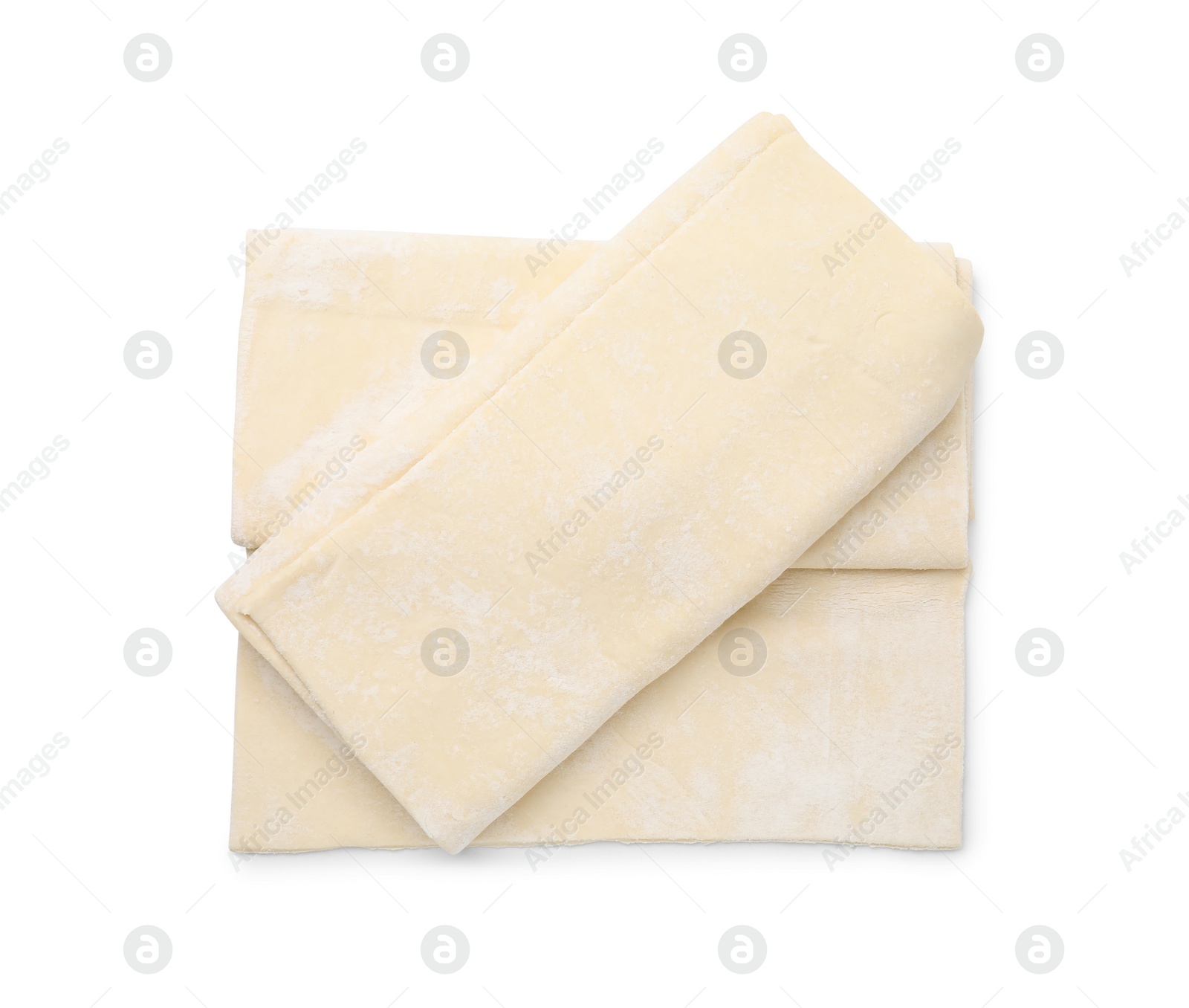 Photo of Raw puff pastry dough isolated on white, top view