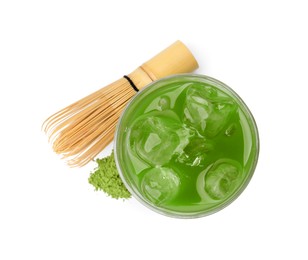 Glass of delicious iced green matcha tea, powder and bamboo whisk isolated on white, top view