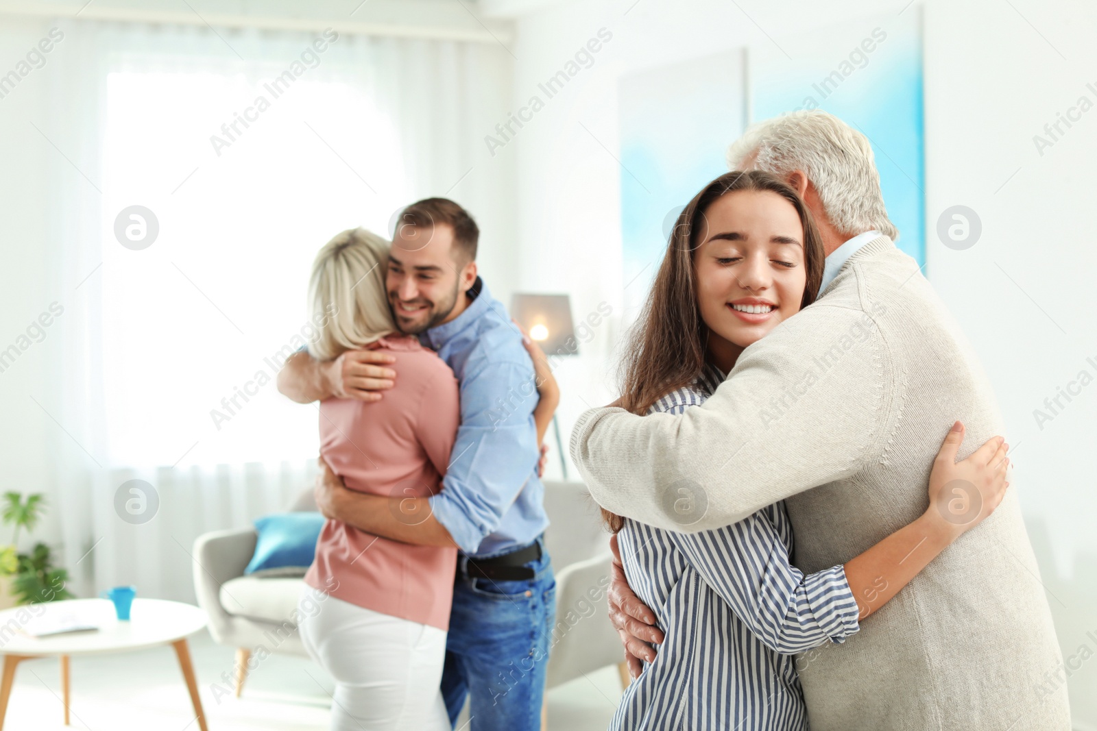 Photo of Happy family at home, space for text. Reunion of generations