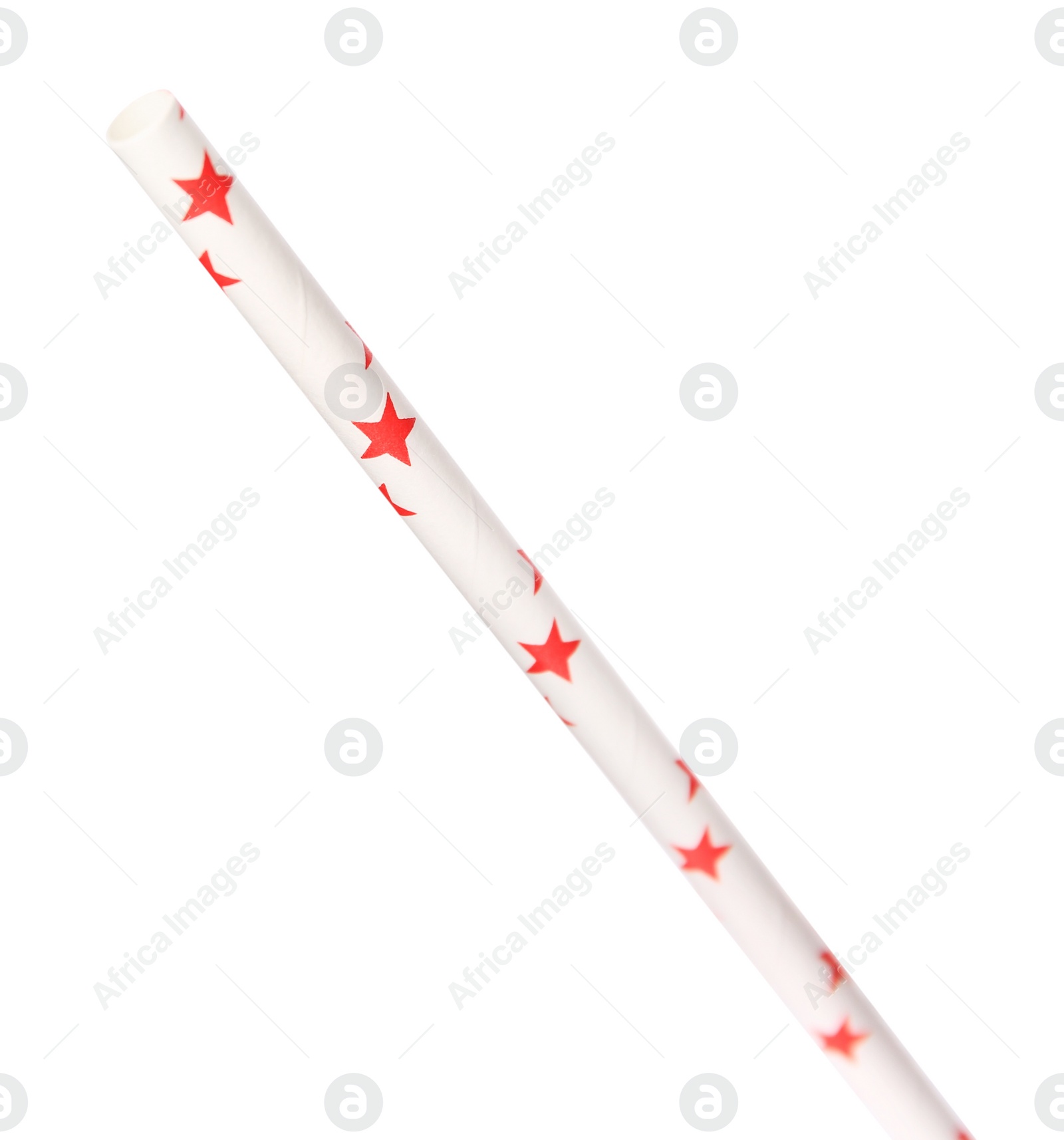 Photo of One paper straw with red stars for drinking isolated on white