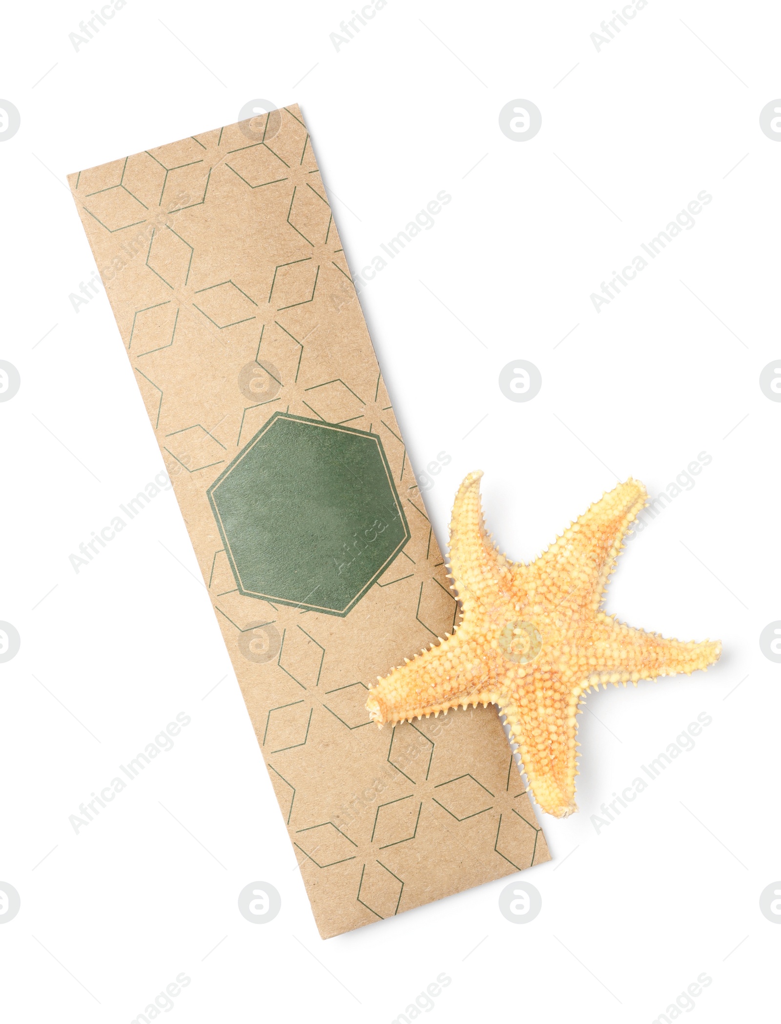 Photo of Scented sachet and starfish on white background, top view