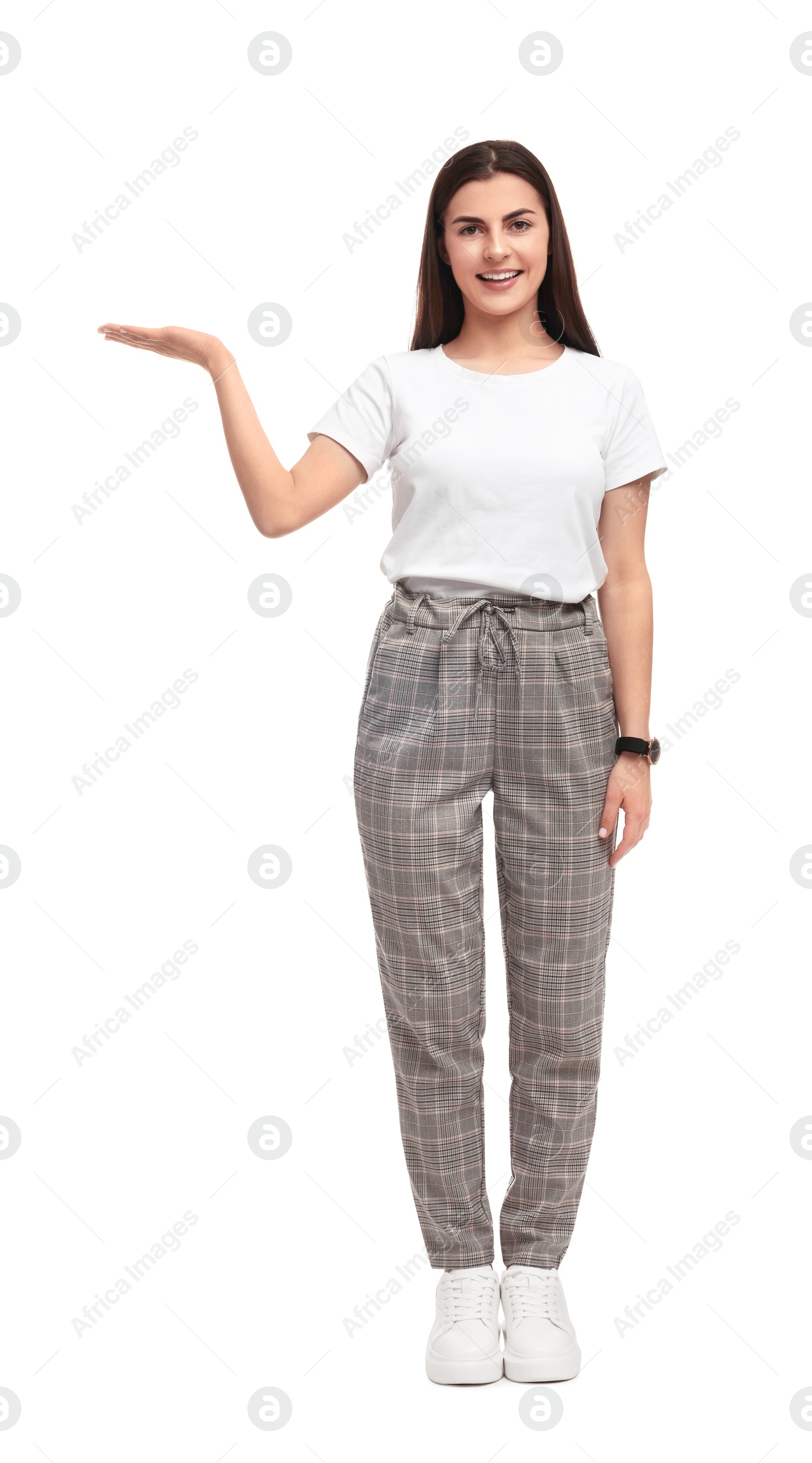 Photo of Beautiful young businesswoman standing on white background