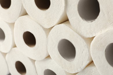 Rolls of paper towels as background, closeup view