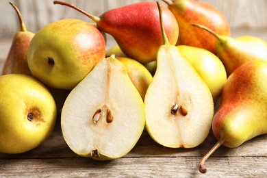 Ripe pears on wooden table. Healthy snack