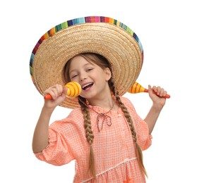 Photo of Cute girl in Mexican sombrero hat singing with maracas on white background
