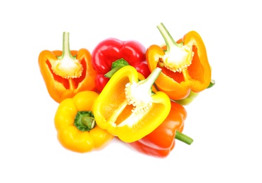 Photo of Whole and cut bell peppers on white background, top view