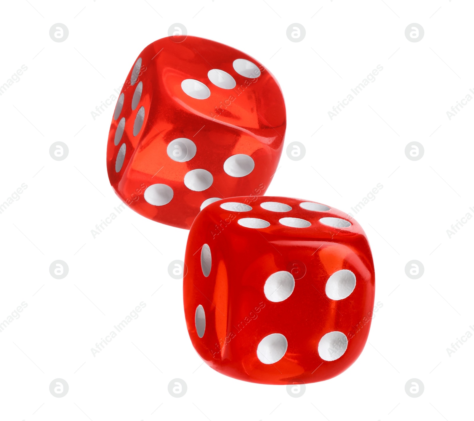 Image of Two red dice in air on white background