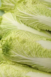 Photo of Fresh ripe Chinese cabbages as background, closeup