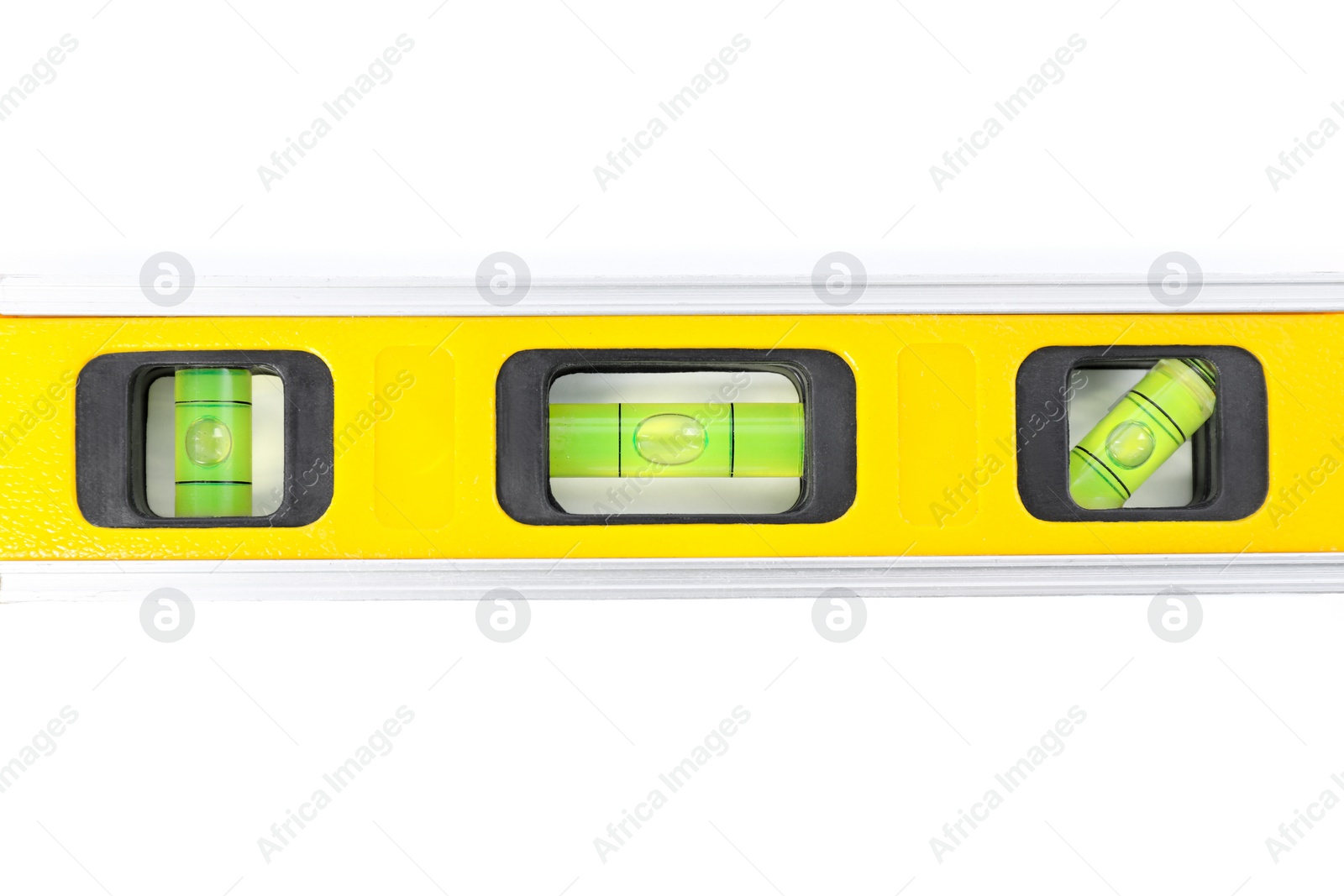 Photo of Yellow building level isolated on white, top view. Construction tool