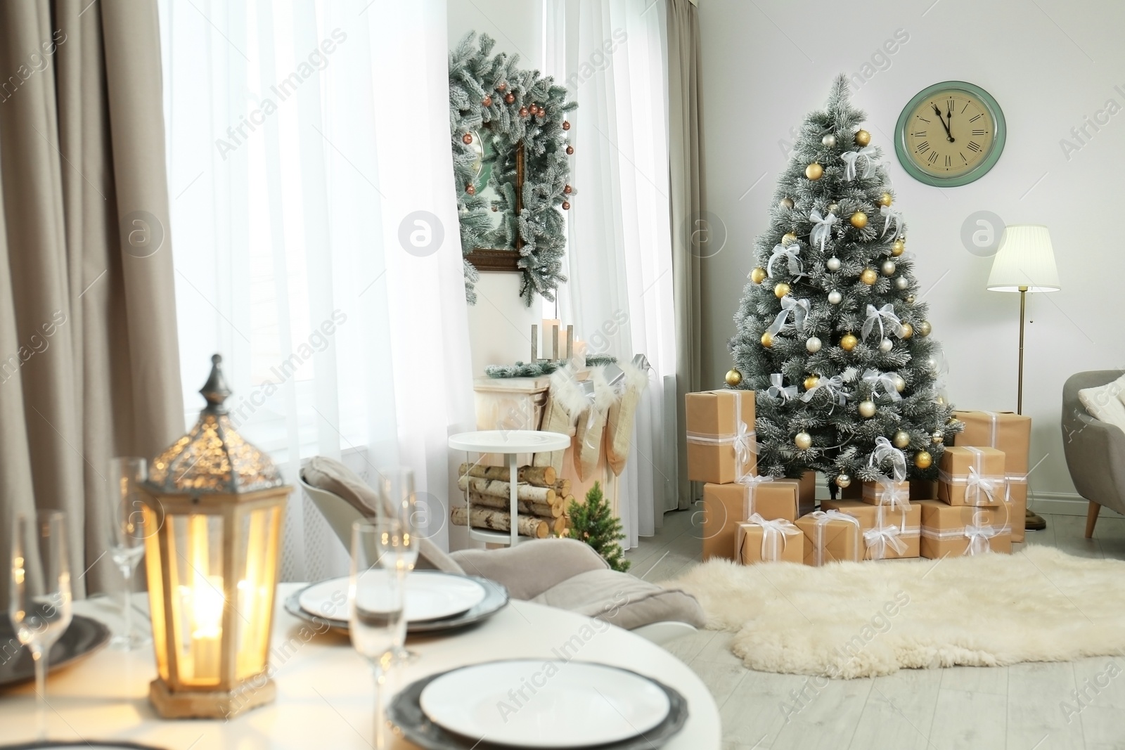 Photo of Decorated Christmas tree in modern living room interior