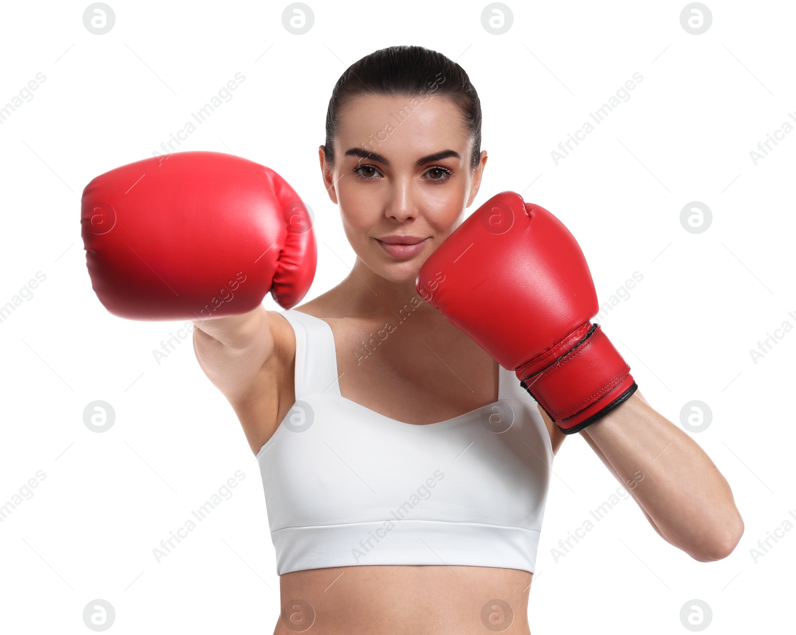 Photo of Beautiful woman in boxing gloves on white background