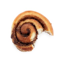 Photo of Tasty bitten cinnamon roll isolated on white, top view