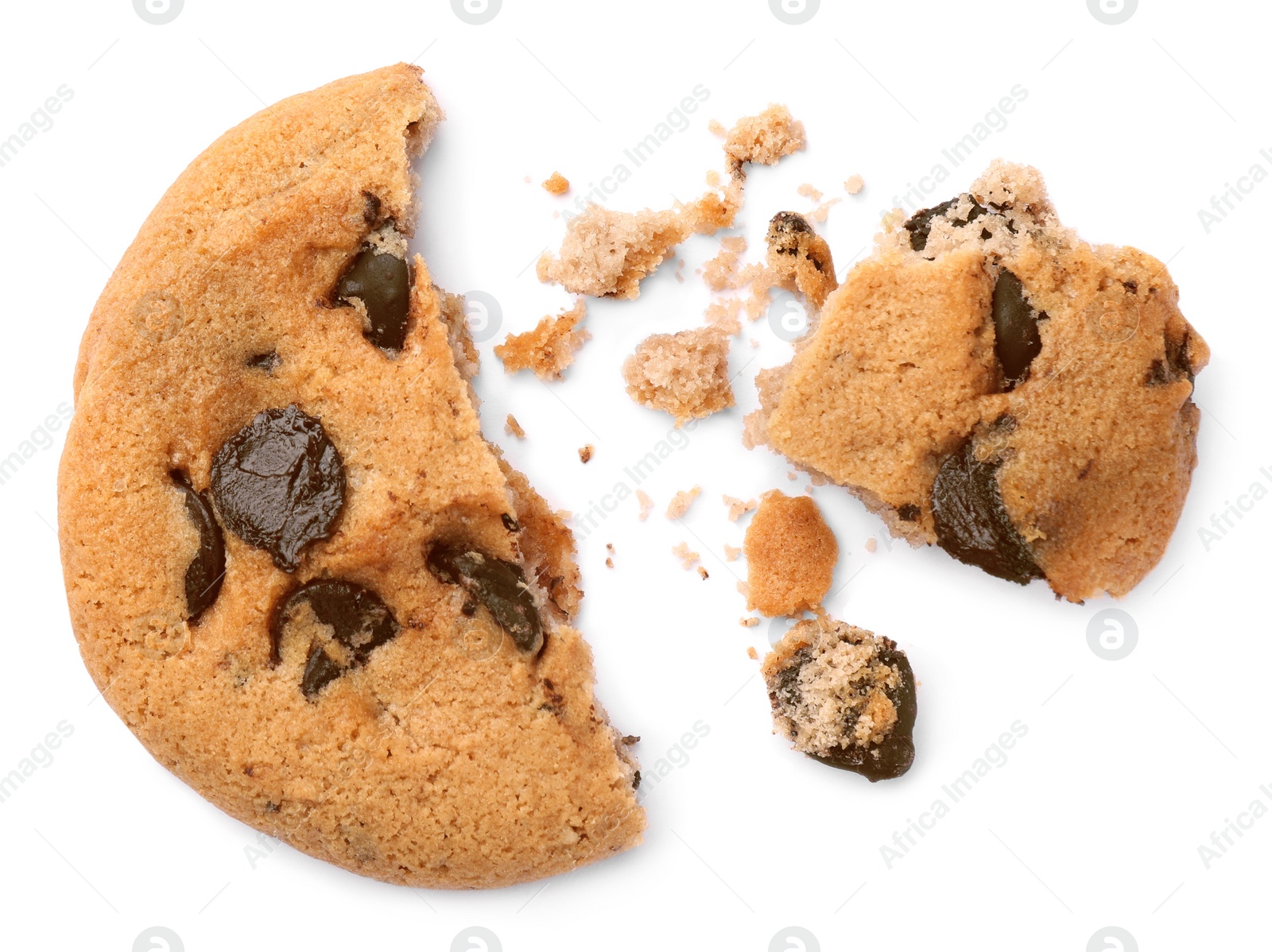 Photo of Pieces of delicious chocolate chip cookie isolated on white, top view