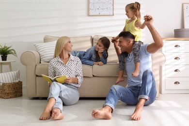 Happy family spending time together at home