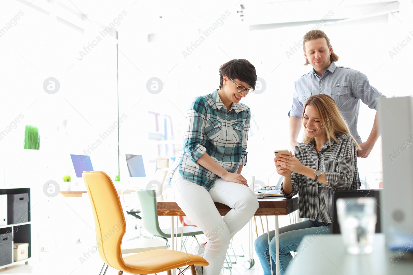 Photo of Young people having business training in office