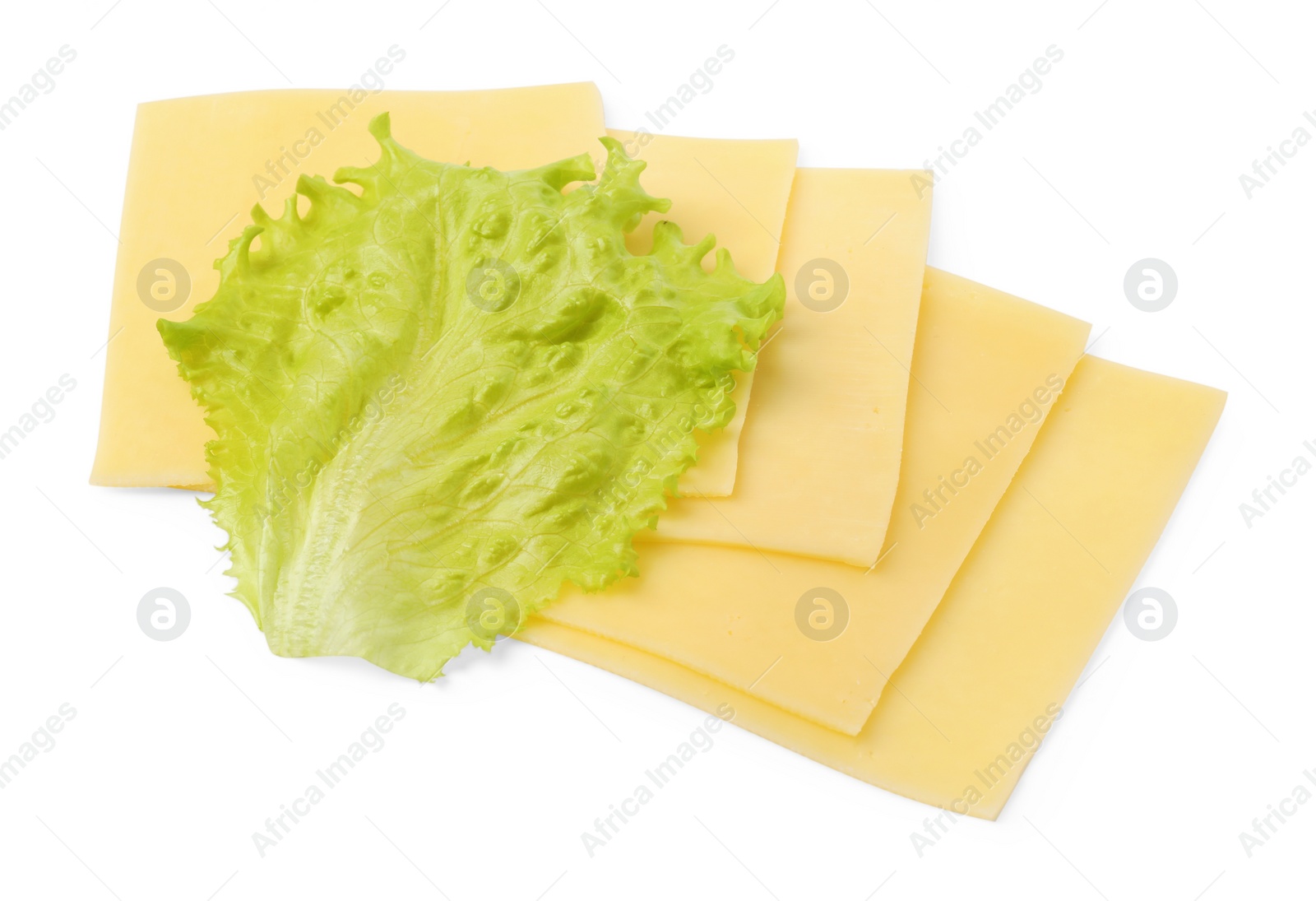 Photo of Slices of tasty fresh cheese and lettuce isolated on white, top view