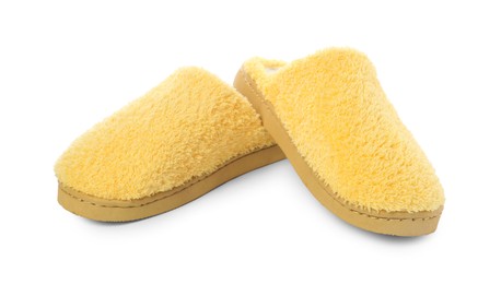 Photo of Pair of yellow soft slippers isolated on white