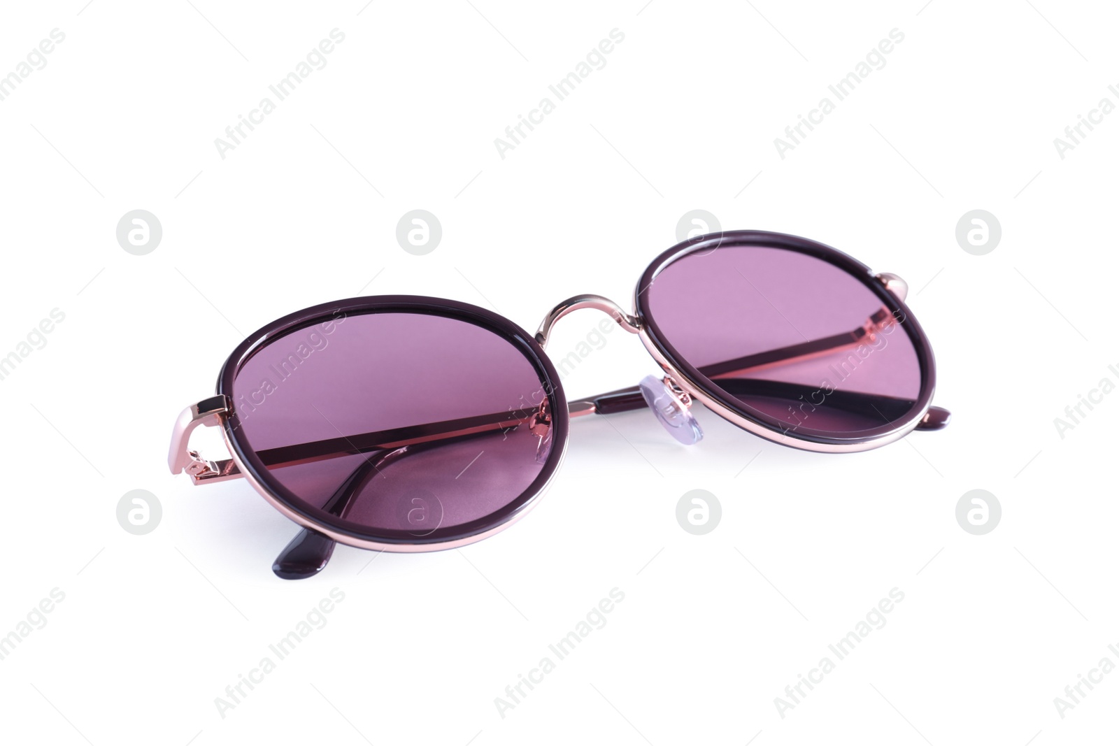 Photo of Stylish sunglasses on white background. Summer accessory