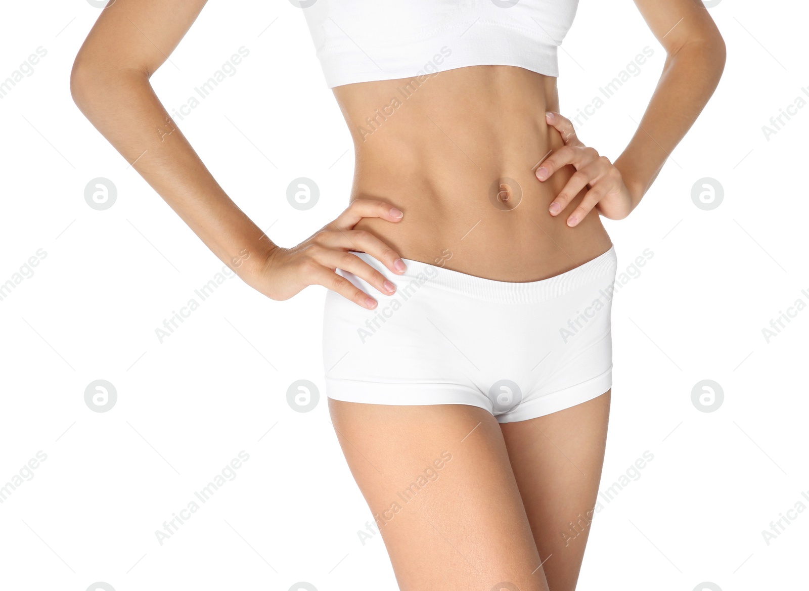 Photo of Young slim woman in underwear on white background. Weight loss diet