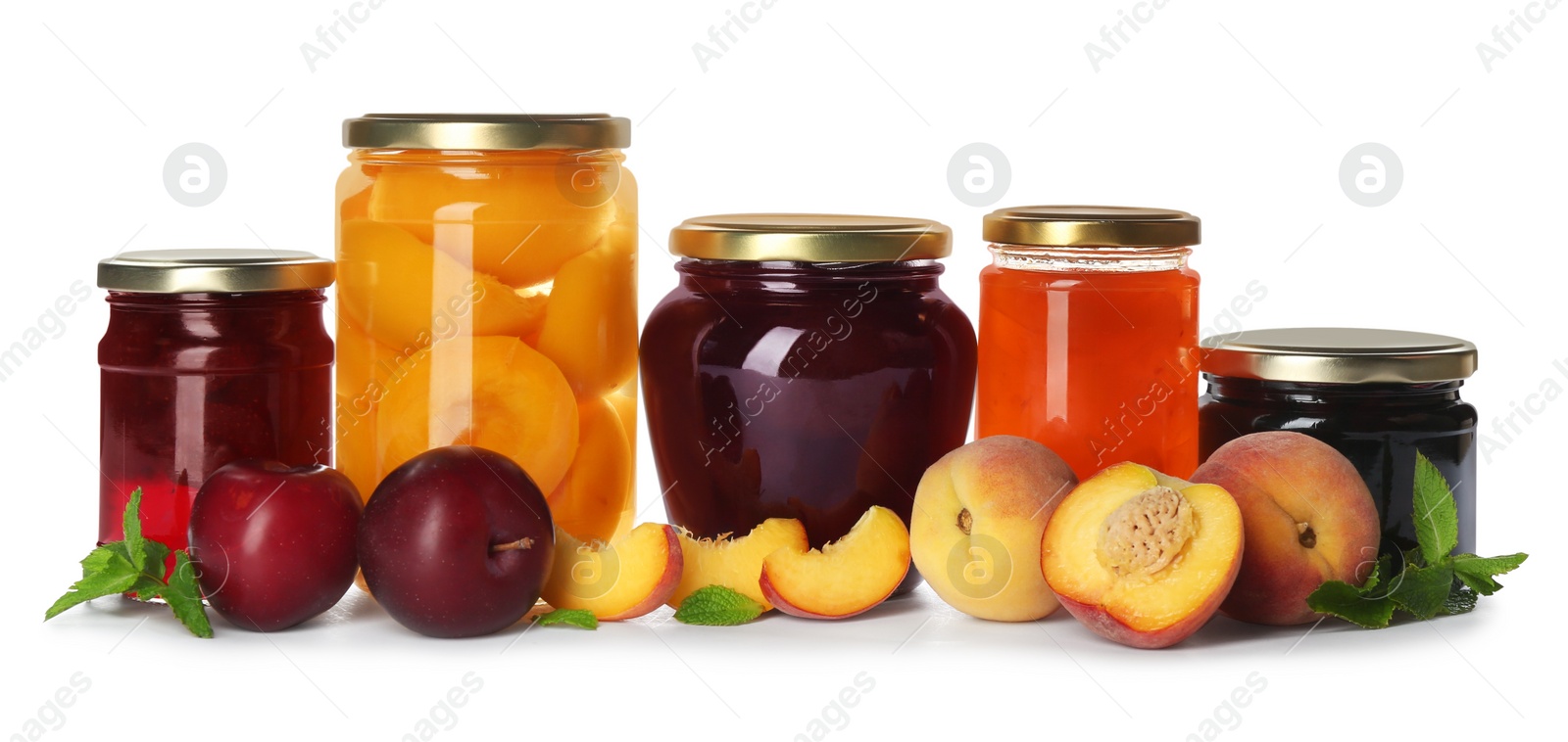 Photo of Glass jars with different pickled fruits and jam on white background