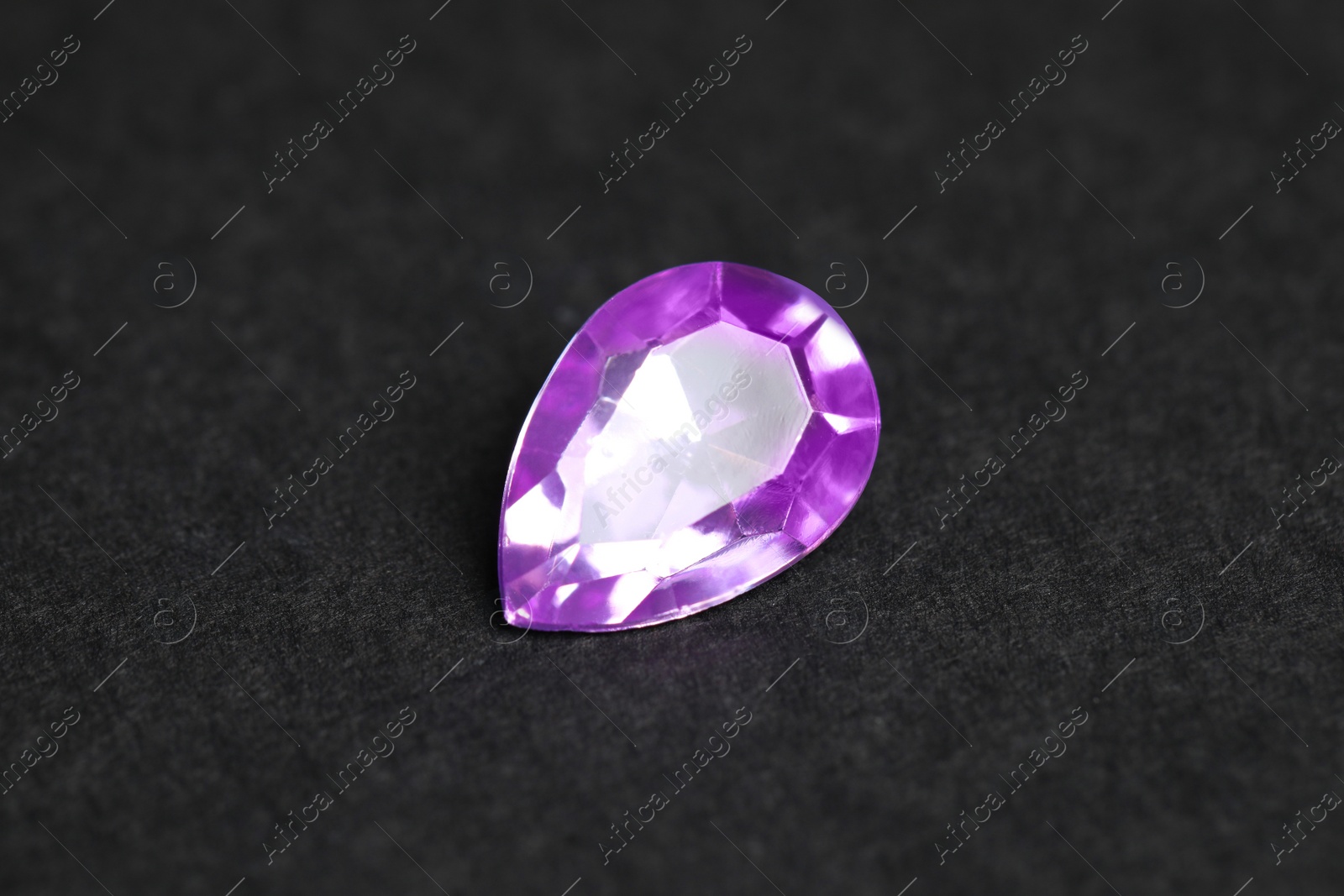 Photo of Beautiful gemstone for jewelry on black background