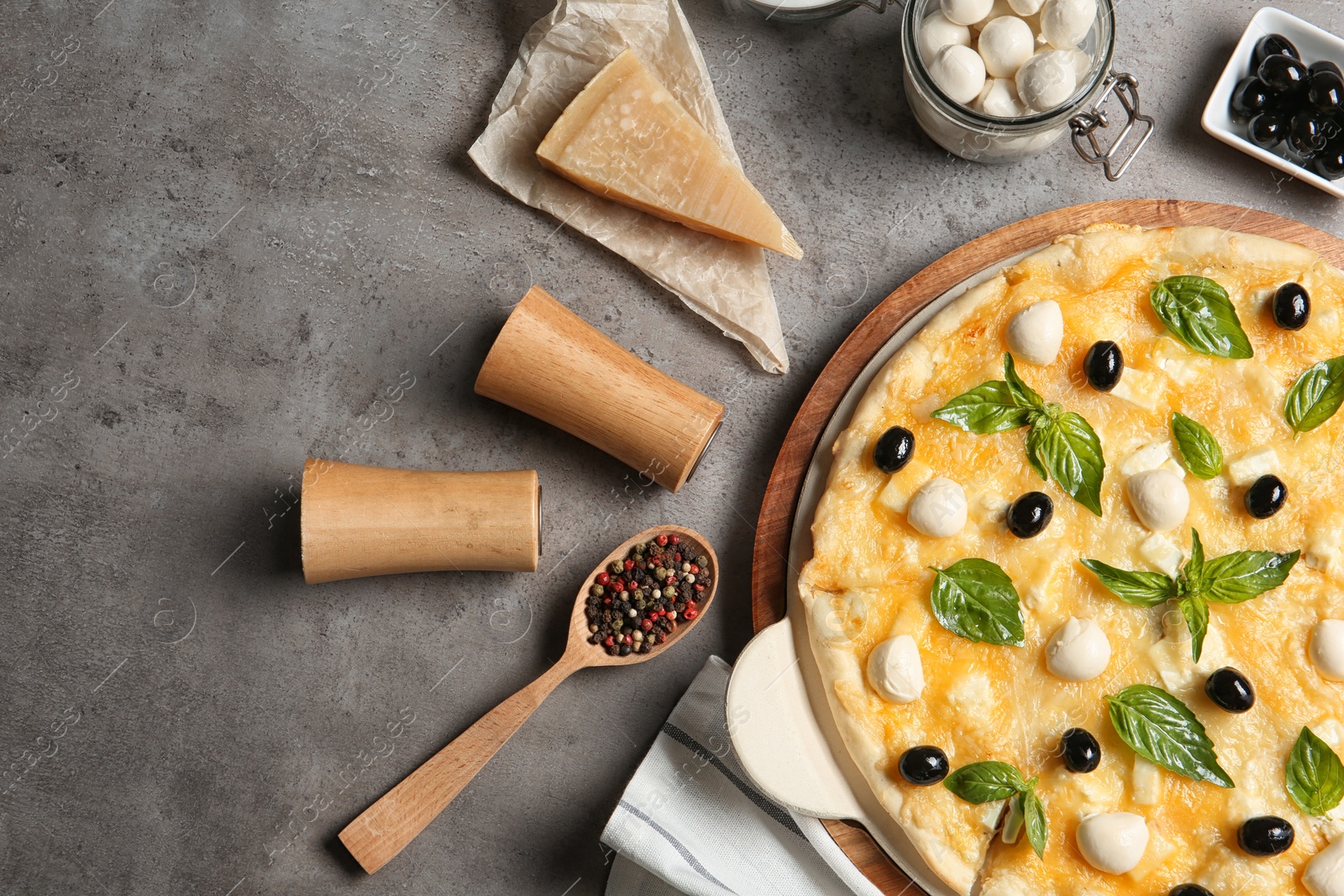 Photo of Flat lay composition with tasty homemade pizza on table