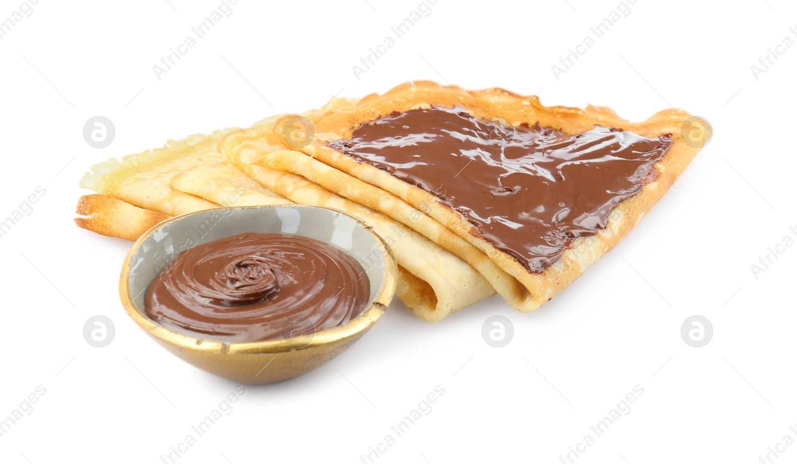 Photo of Tasty crepes with chocolate paste isolated on white