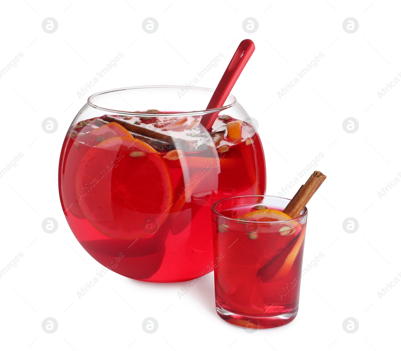 Photo of Glass and bowl with aromatic punch drink isolated on white