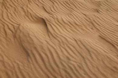 Photo of Closeup view of sand dune in desert as background