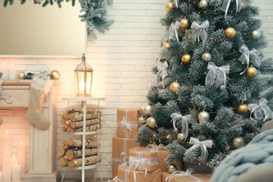 Decorated Christmas tree in modern living room interior