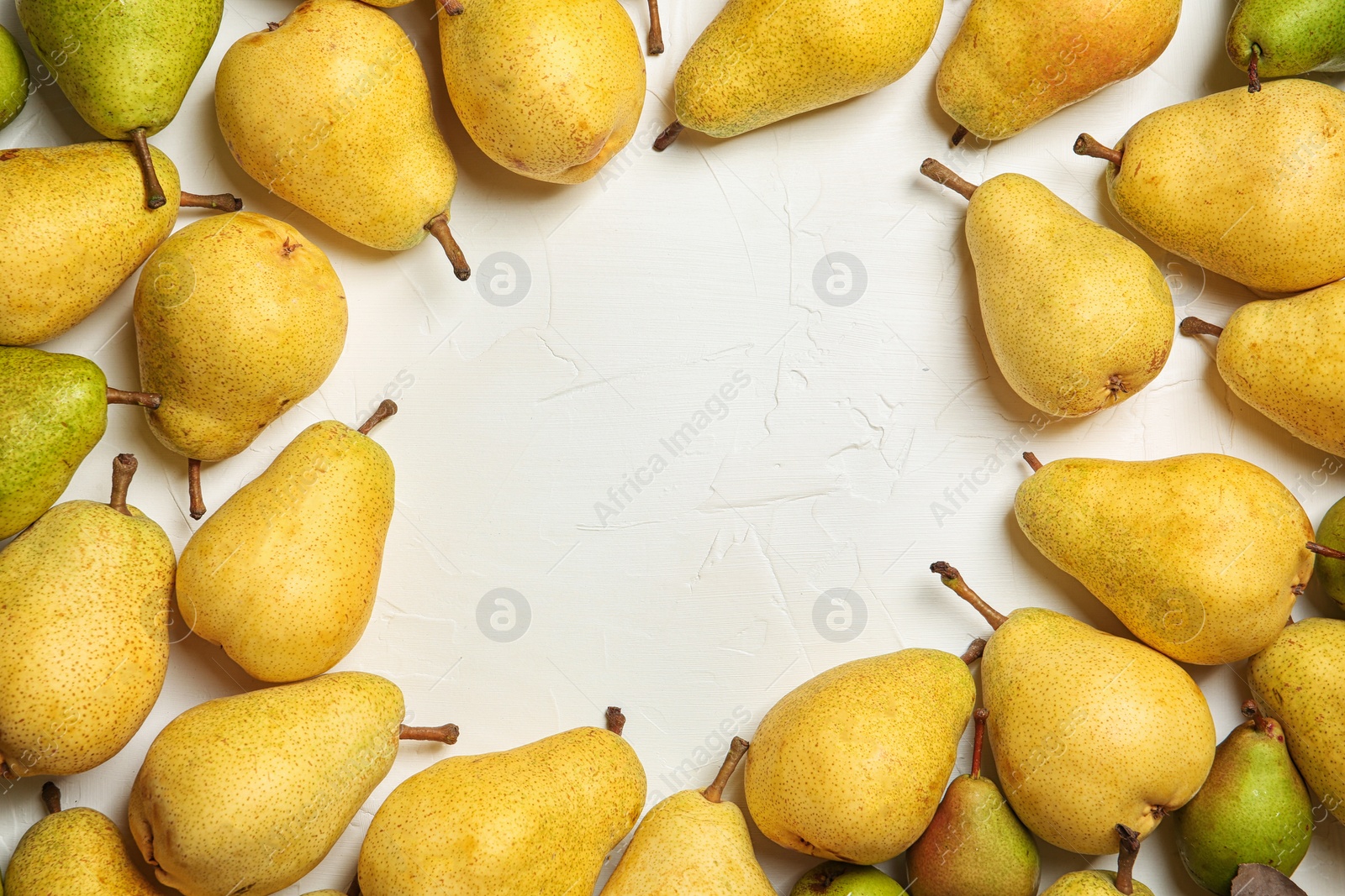 Photo of Flat lay composition with fresh ripe pears and space for text on white background