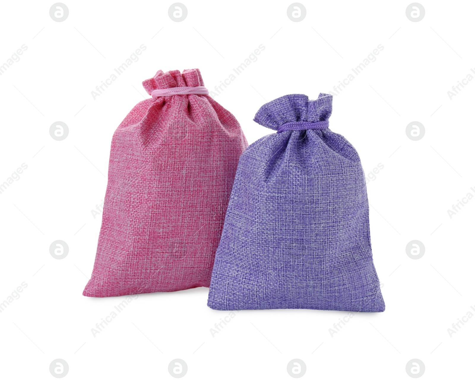 Photo of Two tied burlap bags isolated on white