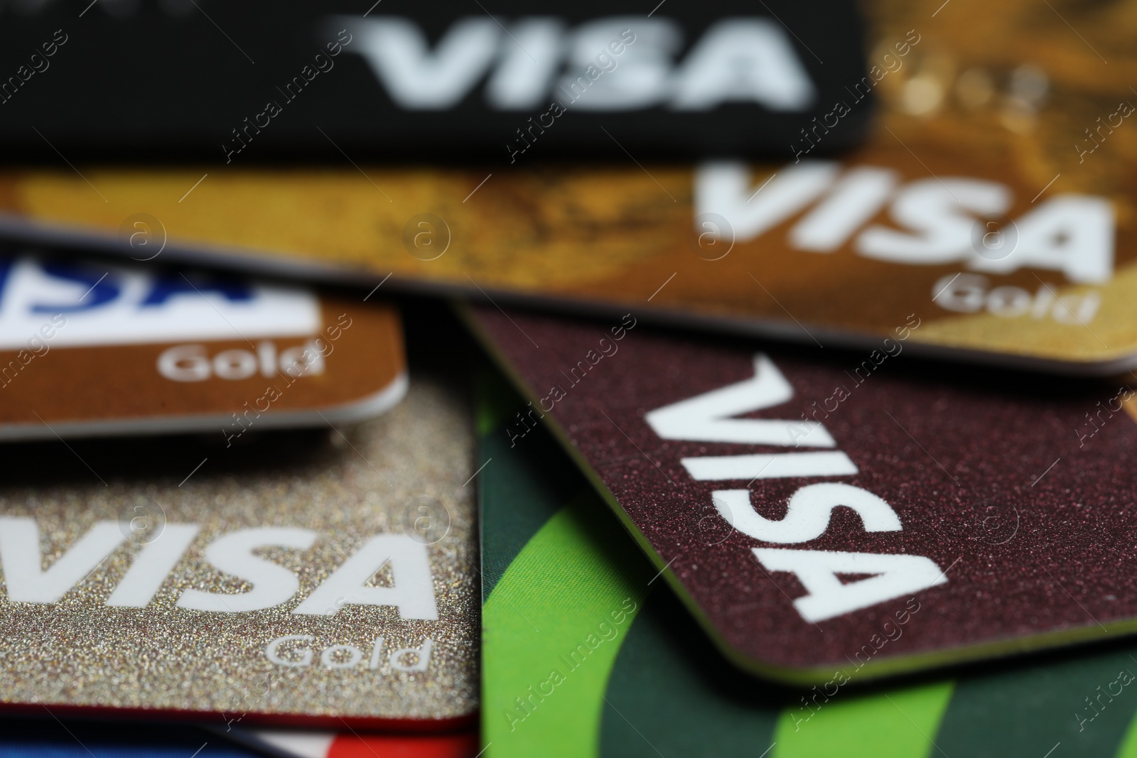 Photo of MYKOLAIV, UKRAINE - FEBRUARY 22, 2022: Visa credit cards as background, closeup