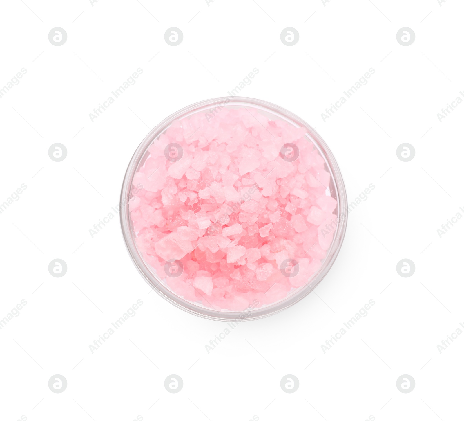 Photo of Glass bowl with pink sea salt isolated on white, top view