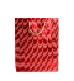 Photo of Red paper shopping bag isolated on white. Space for design