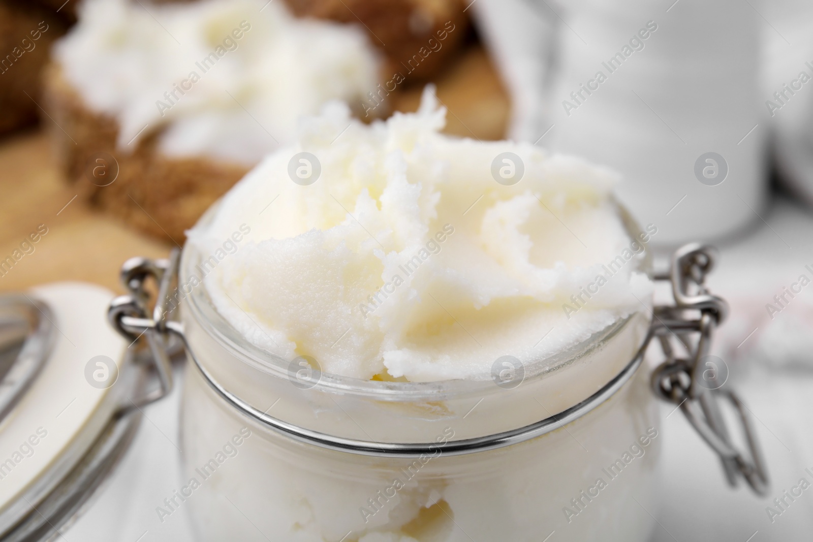 Photo of Delicious pork lard in glass jar, closeup view