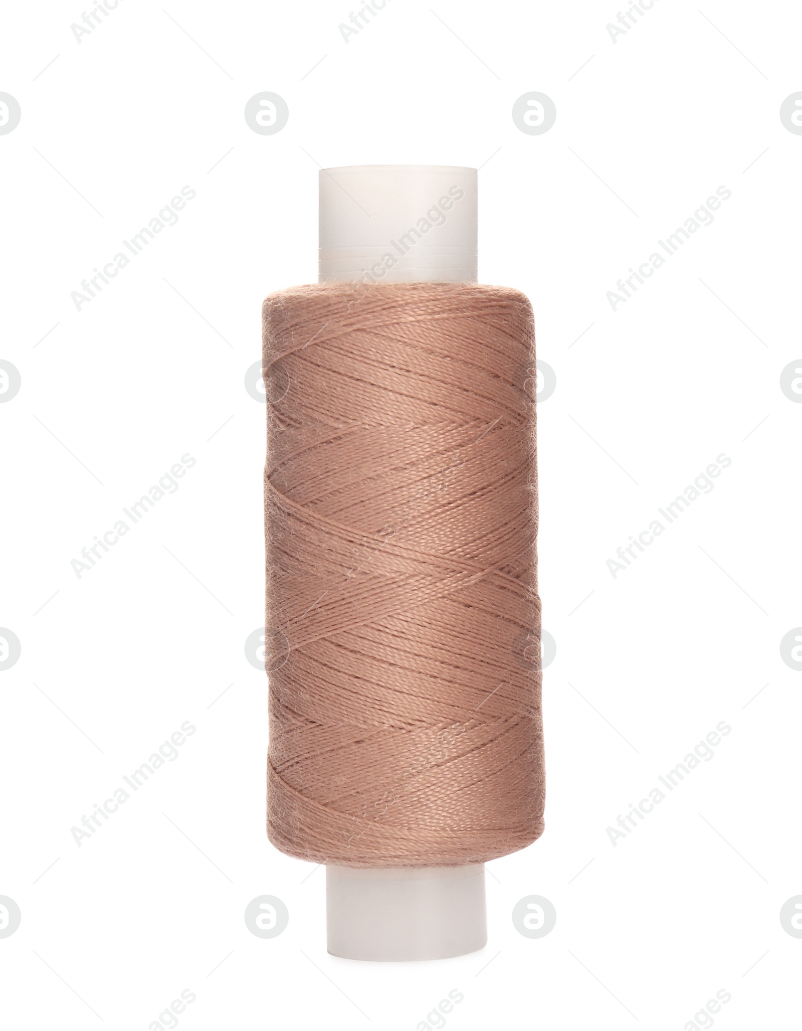 Photo of Spool of pale pink sewing thread isolated on white